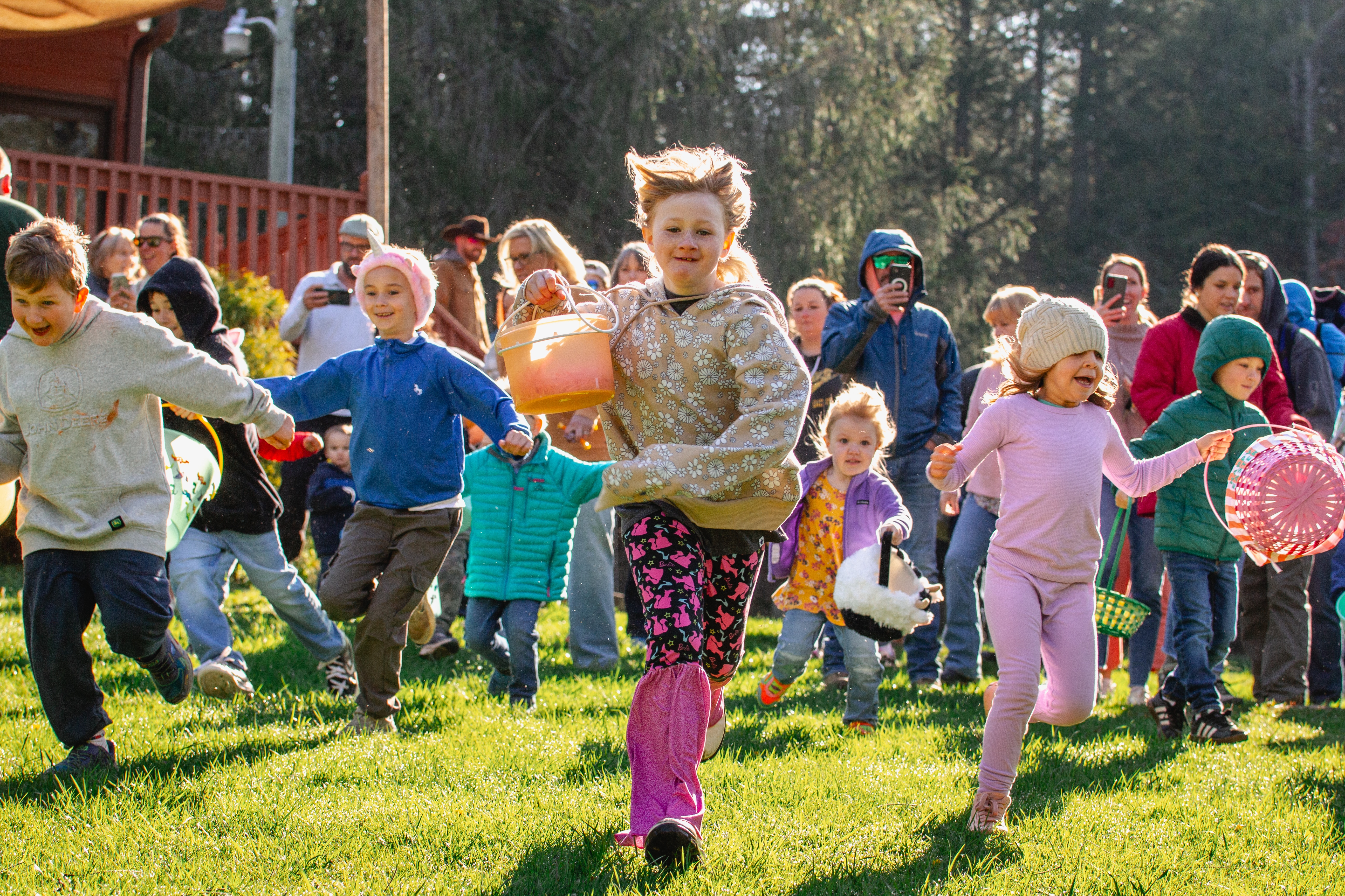 2025 Easter Egg Hunt - kids running, flowing hair (Rebecca Grimmer, 4-12-25)